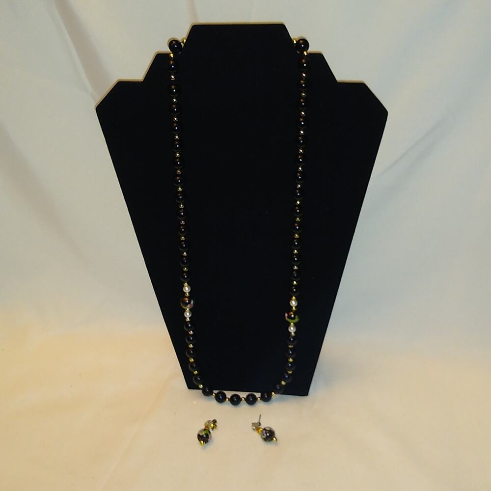 Vintage Black beaded necklace with matching earrings. Classy